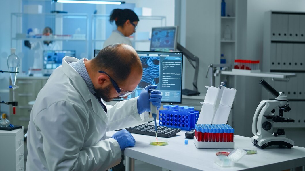 Zynox Labs cleansuit researcher analysing DNA visualization