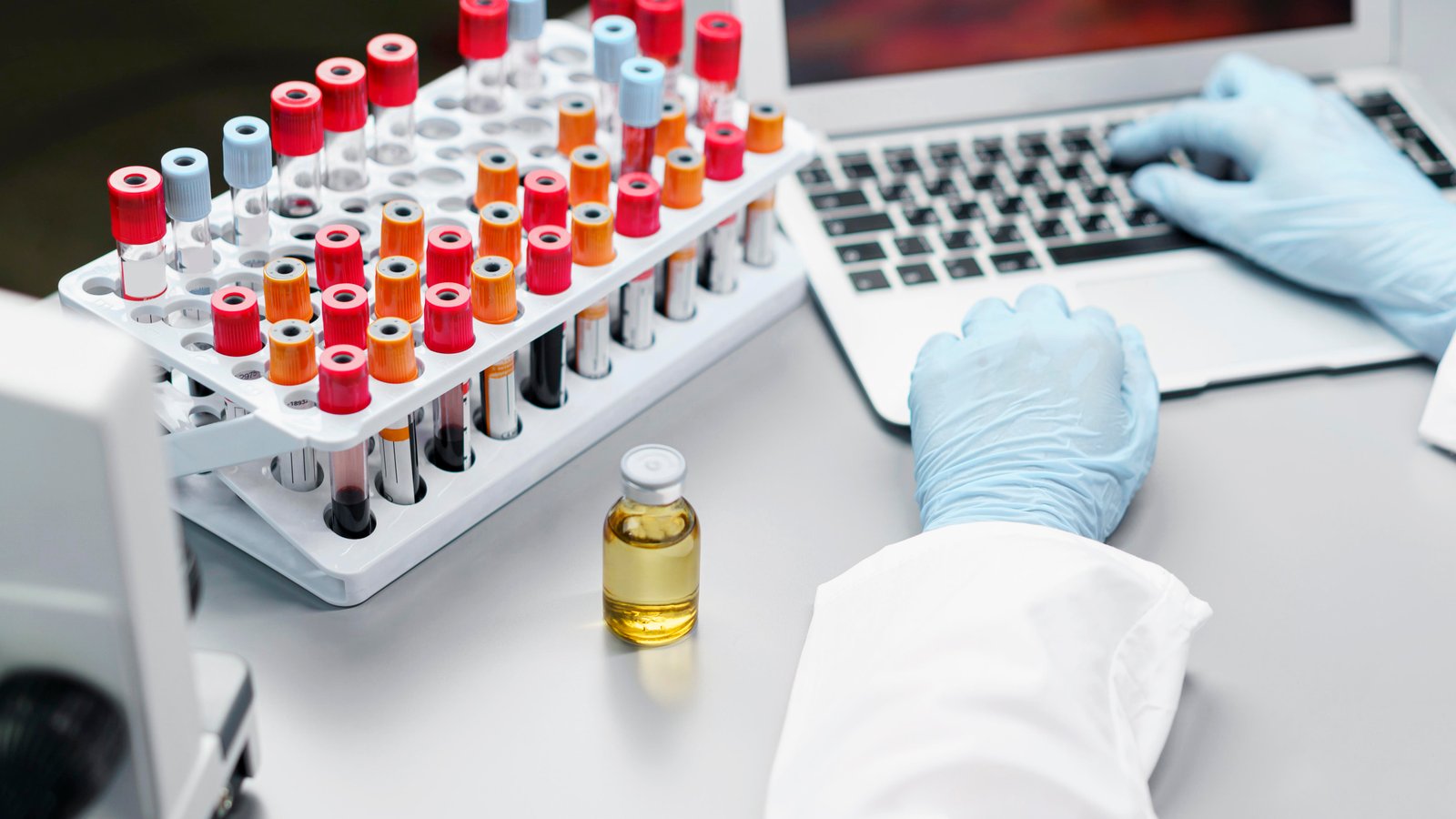 Test tubes and vials arranged on a laboratory bench